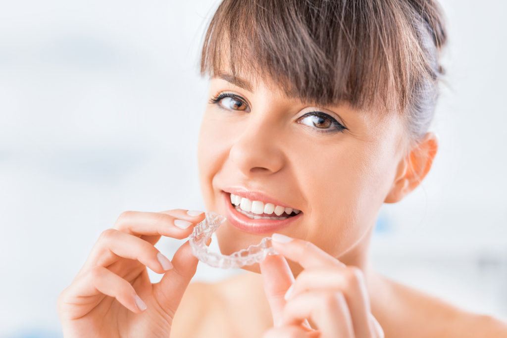 Beautiful smile and white teeth of a young woman.